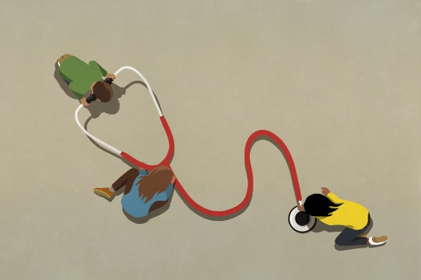 Вид зверху людей, які дивляться на великий стетоскоп