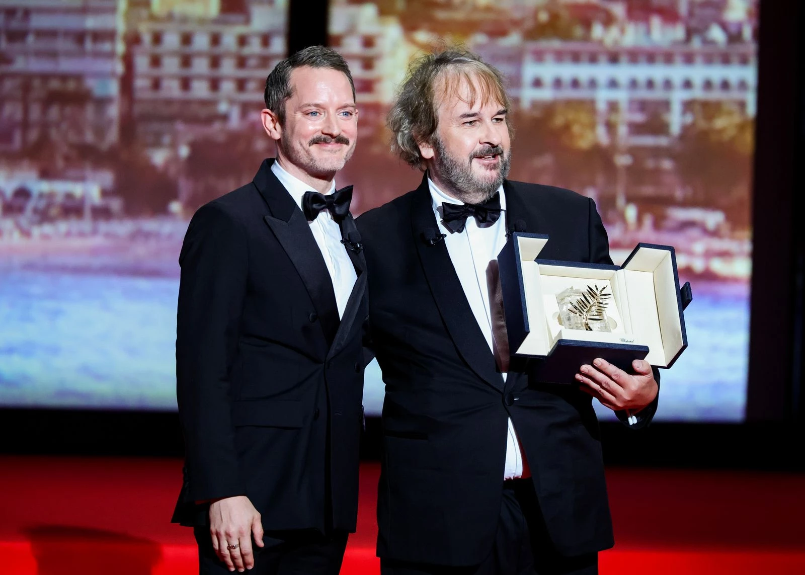 Peter Jackson receives the Honorary Palme d'Or from Elijah Wood0